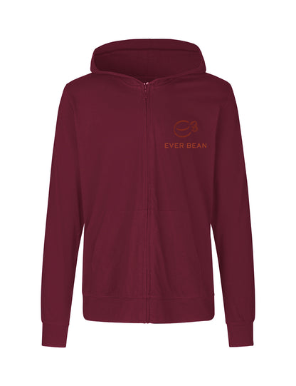 En rødbrun-farvet lynlås Neutral, Hoodie Zip, Herre med en frontlomme. Hættetrøjen har et orange kaffebønne-logo og teksten "EVER BEAN" på brystet. Den er lavet af fairtrade bomuld og har et enkelt, rent design med en hætte og lange ærmer, der sikrer, at din komfort stemmer overens med etiske certificeringer.