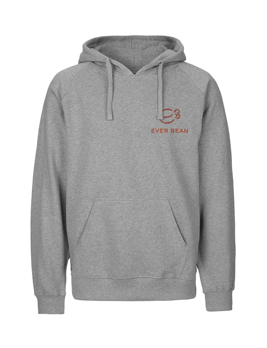 En Neutral Hoodie Junior med en frontlomme og snøre på hætten. Den har det minimalistiske EverBean-logoet - en kaffekop og "EVER BEAN"-tekst i brun - øverst til venstre på brystet, hvilket gør det ikke bare stilfuldt, men også et miljøvenligt valg.